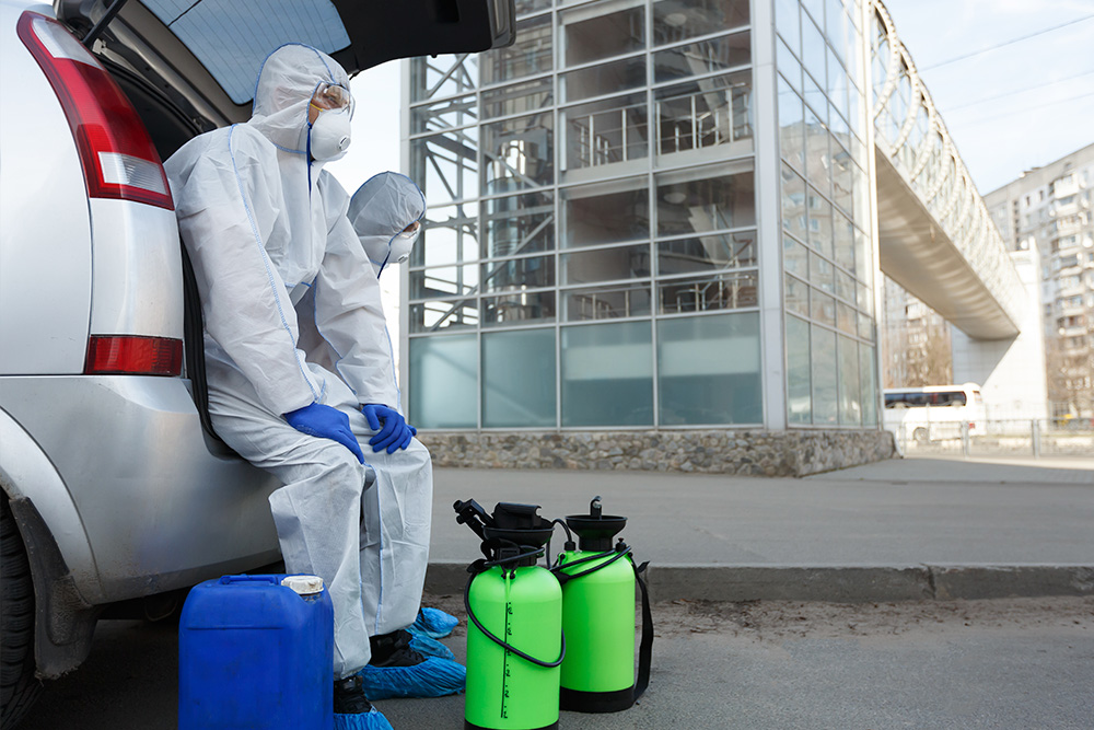 Commercial hazardous material transport team with containment equipment – protect your CDL from hazardous material violations